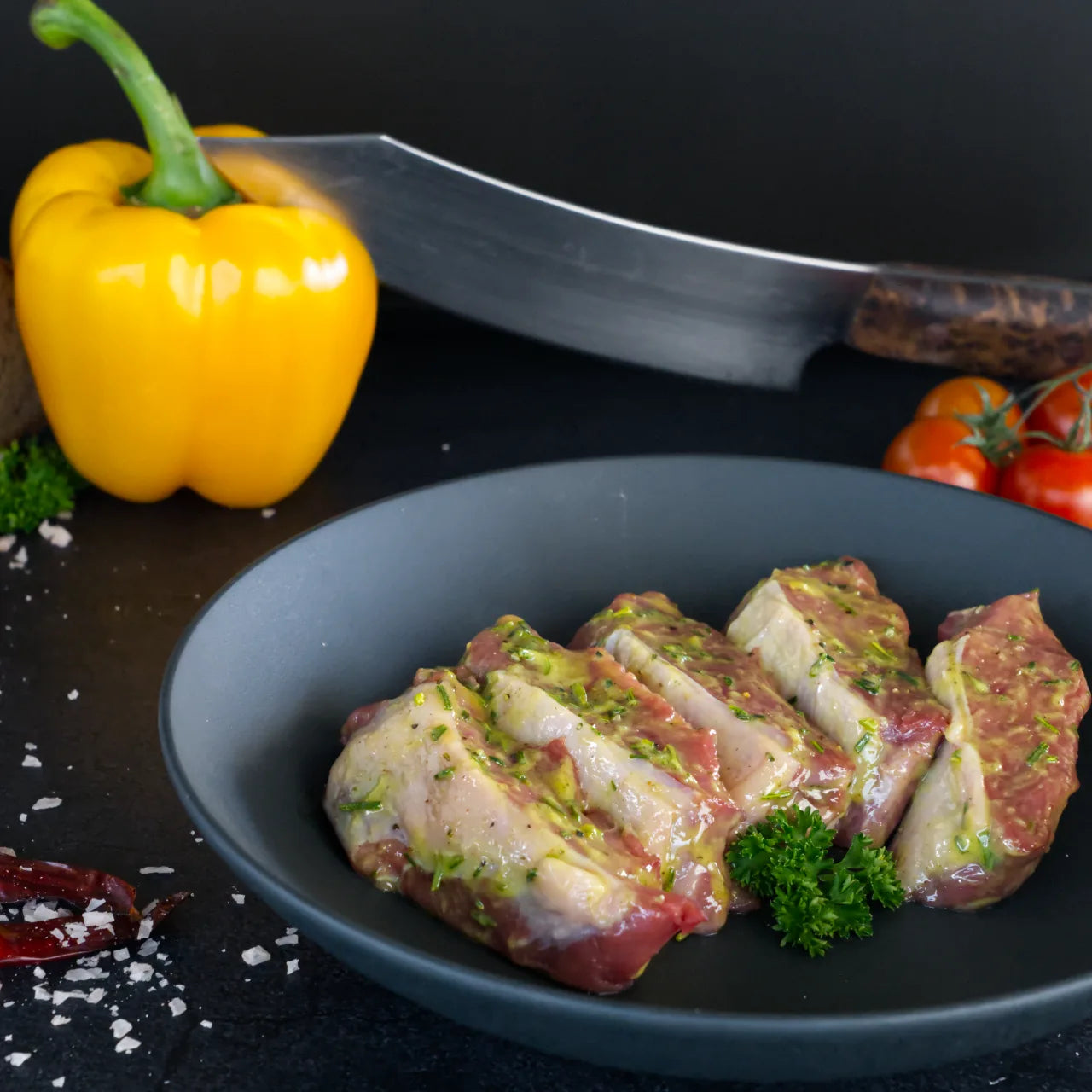 Marinated wild boar steaks